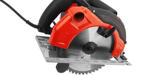 A close-up of a circular saw on a white background. The saw is black and red and has a large toothed blade.