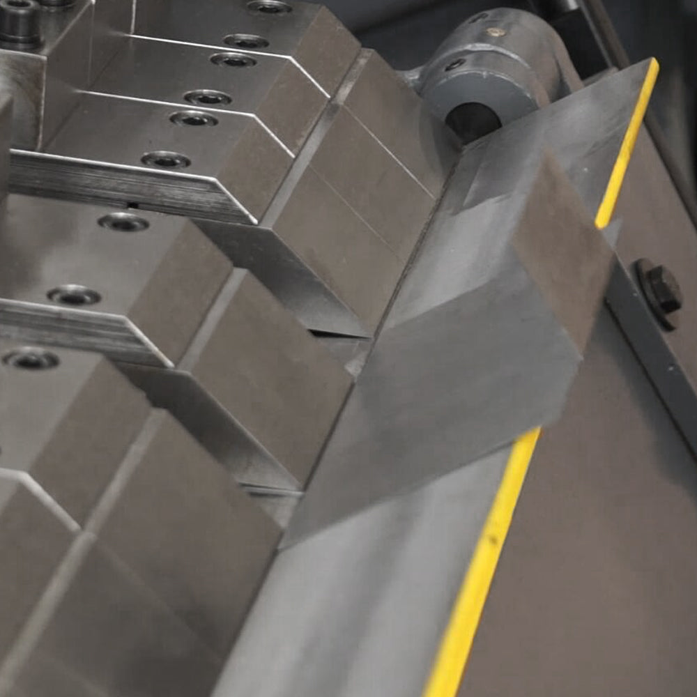 segmented bending fingers close-up with various widths, enabling complex box and pan shape forming W-10012A