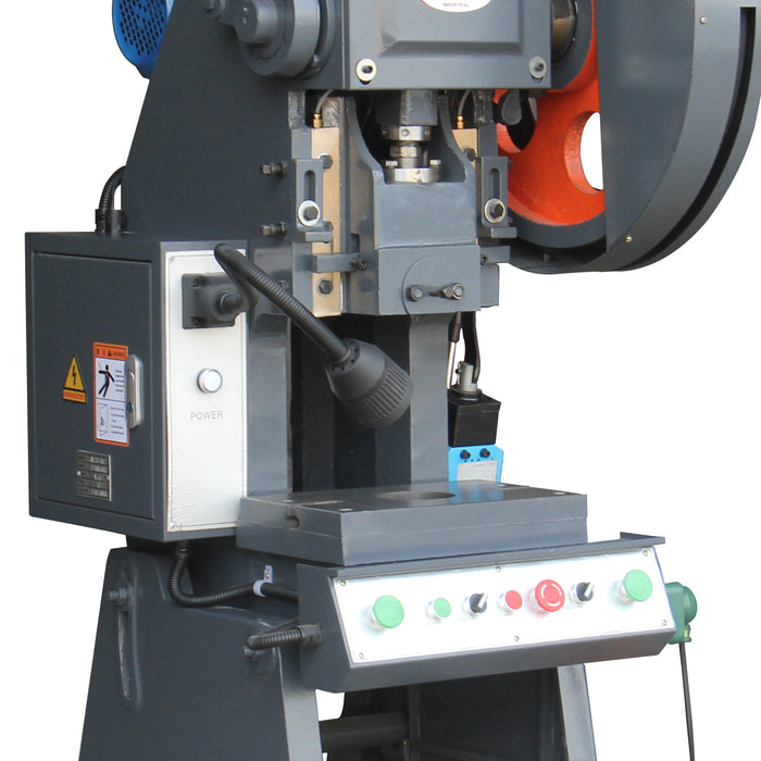 Upper frame and control panel of a 10-Ton OBI mechanical punch press, highlighting the slide block and safety labels, model JB23-10