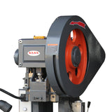 10-Ton punch press cast iron flywheel with orange center and black rotation guard, storing energy for consistent strokes, model JB23-10