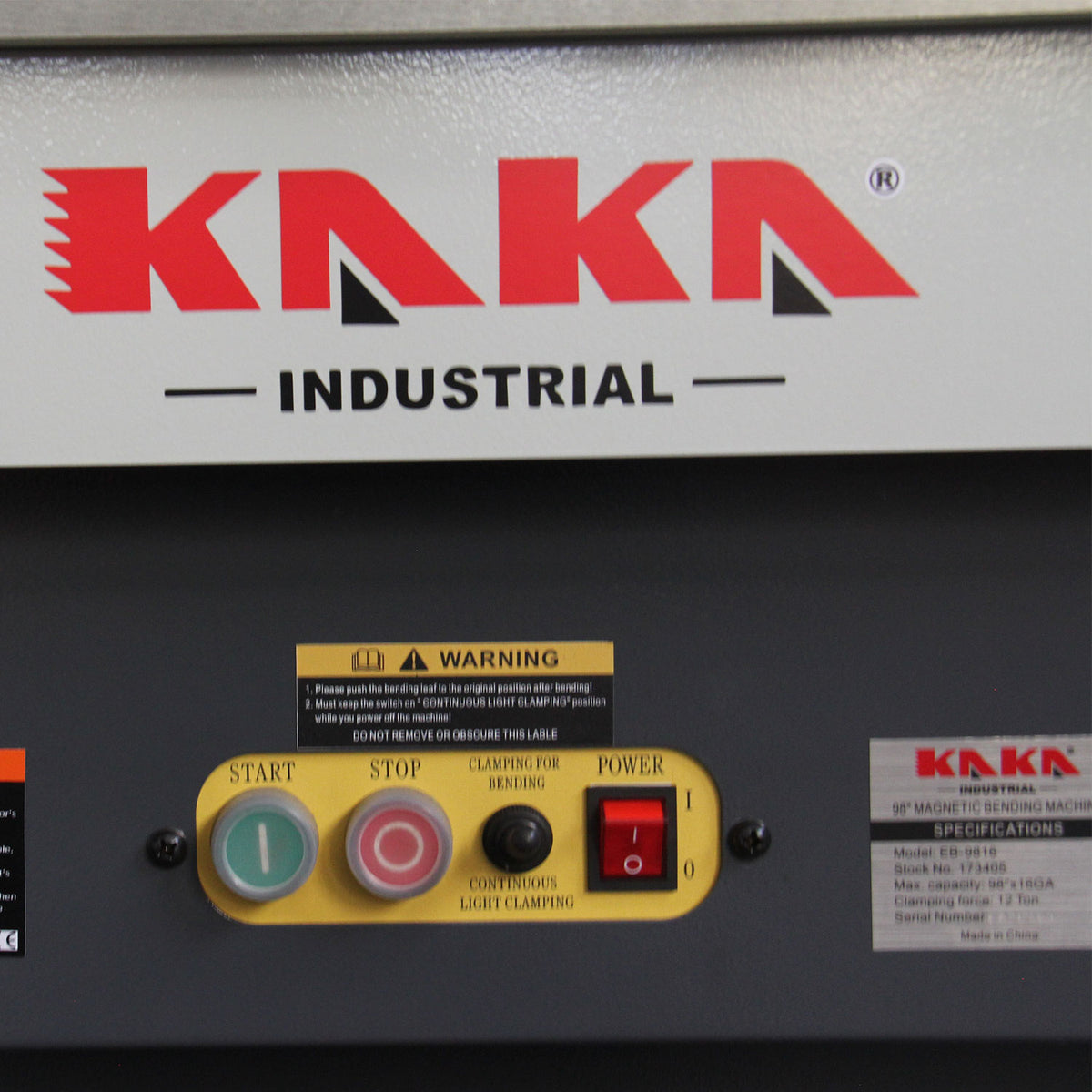 Magnetic sheet metal brake control panel close-up with start and stop buttons, power switch, and warning labels, EB-9816